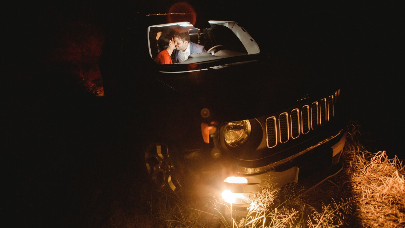 Jeep at night with the interior dome light on